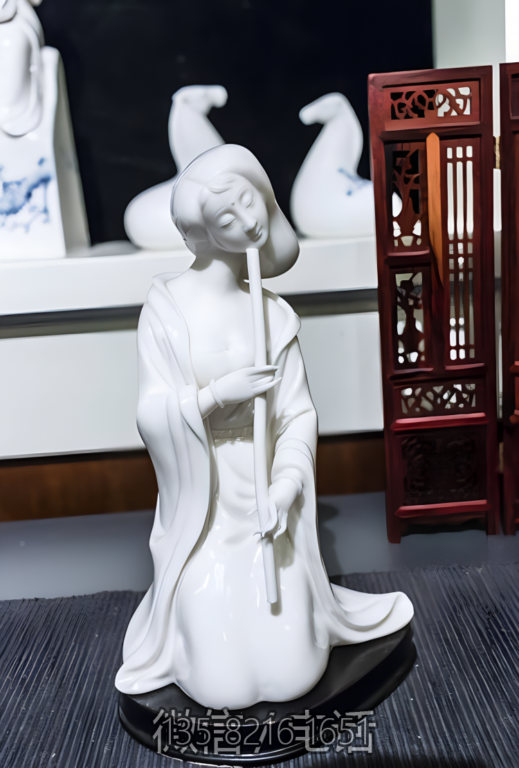 漢白玉吹簫的古代美女石雕