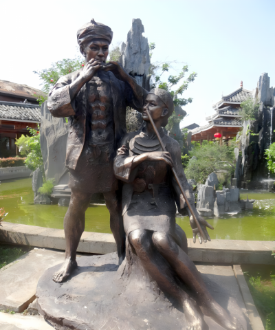吹奏樂器的少數(shù)民族情景人物銅雕吹奏雕塑
