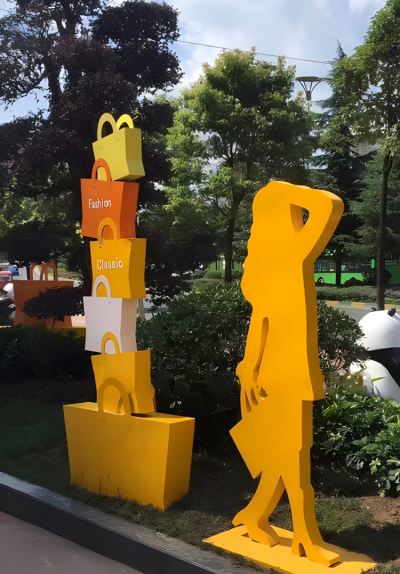 剪影不銹鋼購物人物購物袋雕塑